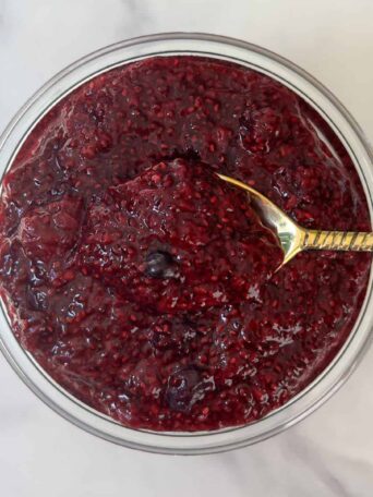 Mixed Berry Jam in a mason jar.