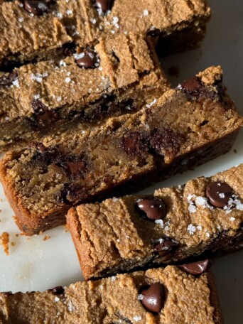 Chickpea blondies topped with sea salt flakes.