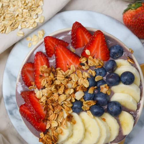 easy protein acai bowl - feasty travels