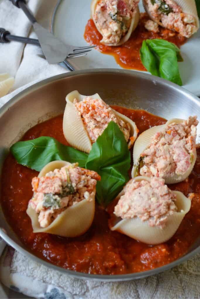 healthy gluten free stuffed shells with feta, tomato and basil feasty