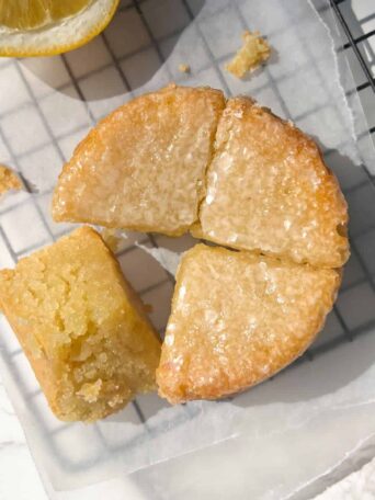 Vegan Olive Oil Cake Sliced and topped with a light glaze.