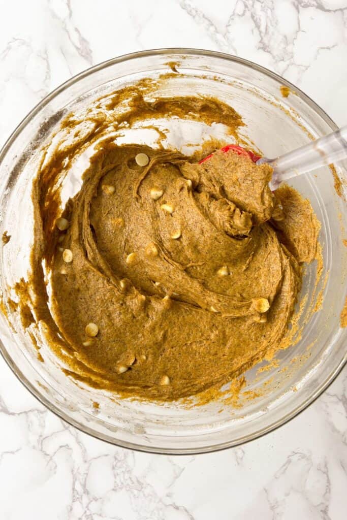 making copycat paula deen pumpkin bars in a mixing bowl