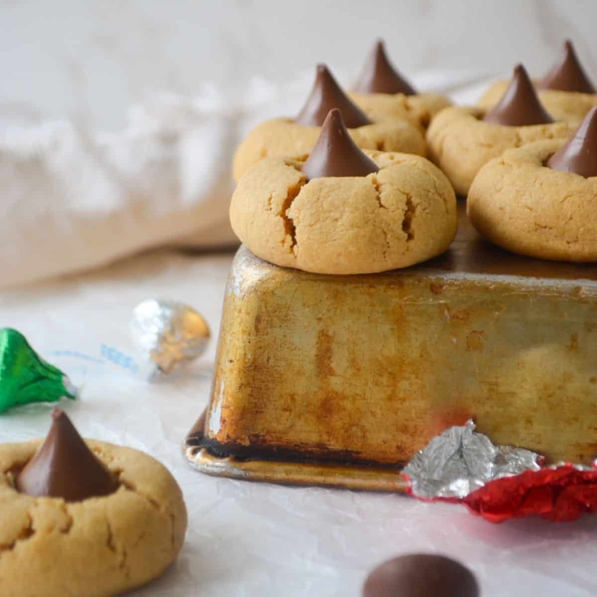 peanut butter blossoms with hershey kisses on a tray