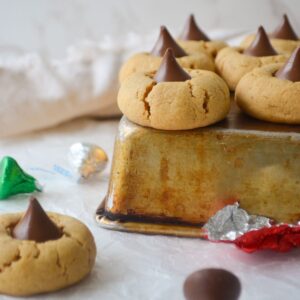 Gluten Free Peanut Butter Blossoms next to each other on a tray.