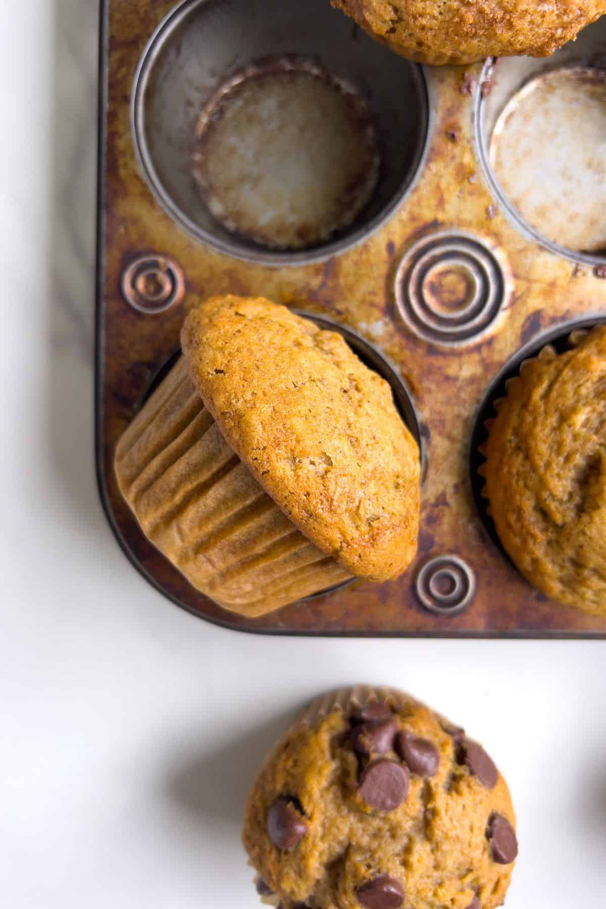 Baked Zucchini Gluten Free Muffin in the muffin tin.