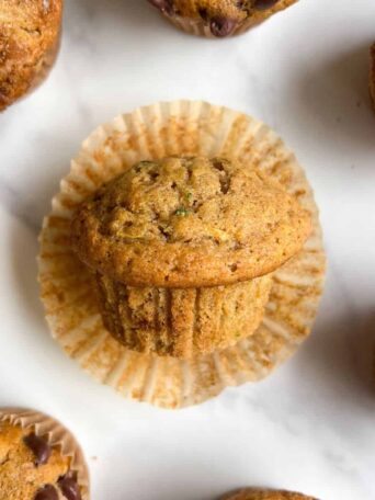 Zucchini Gluten Free Muffin with the wrapper taken off.