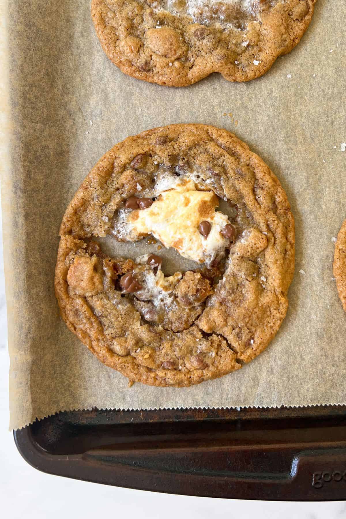 Chocolate Chip Marshmallow Cookie broken in half.