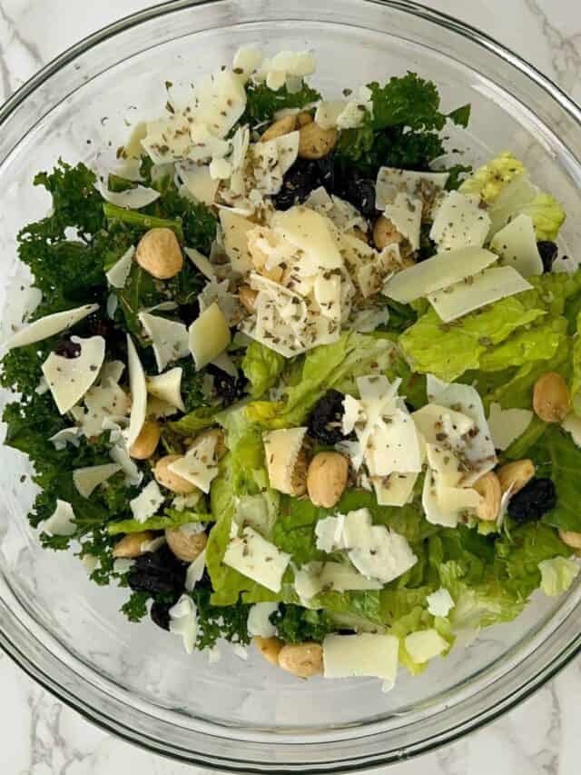 chopped kale salad with dried cherries and marcona almonds feasty travels