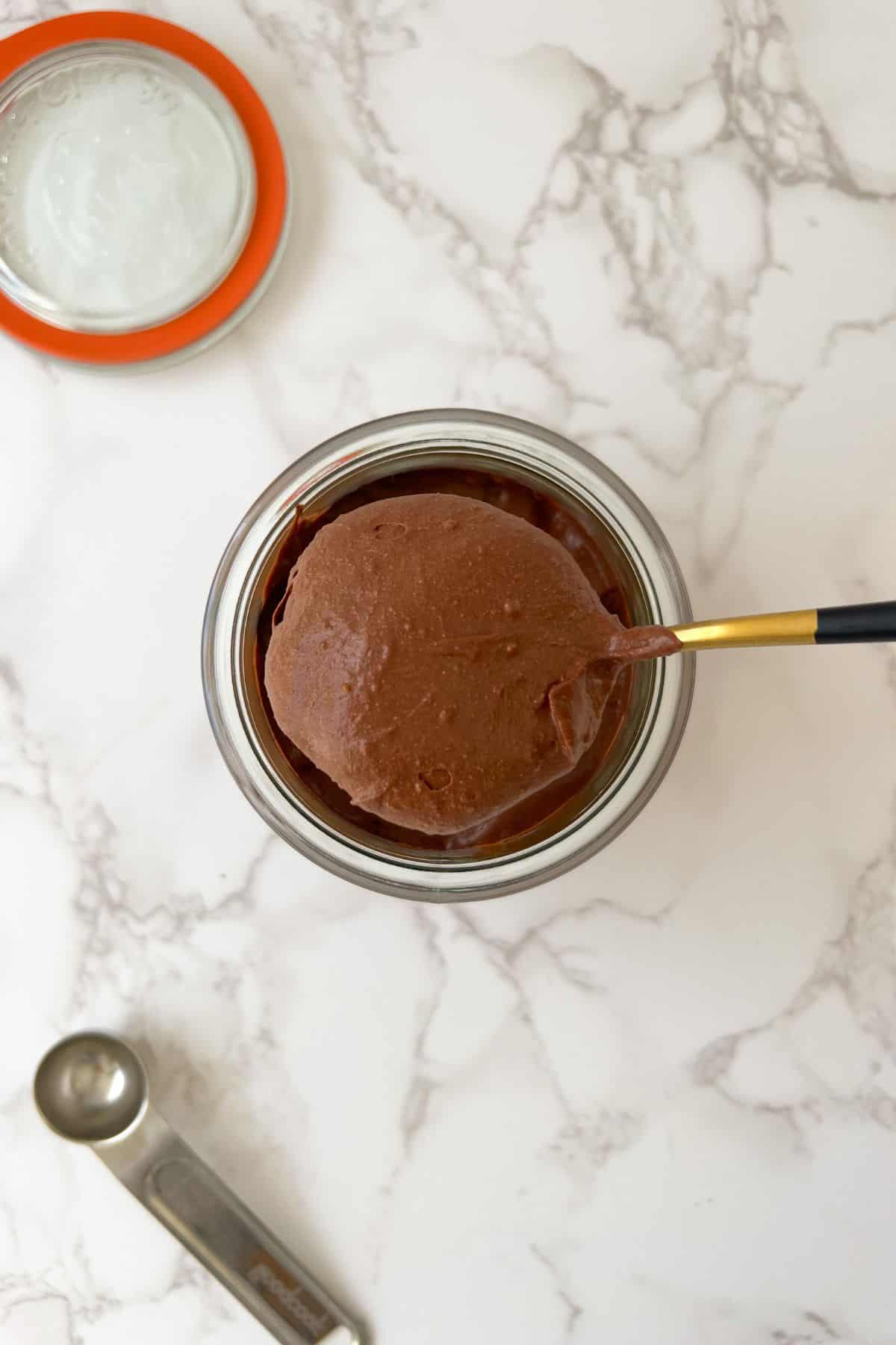 scoop of high protein chocolate mousse