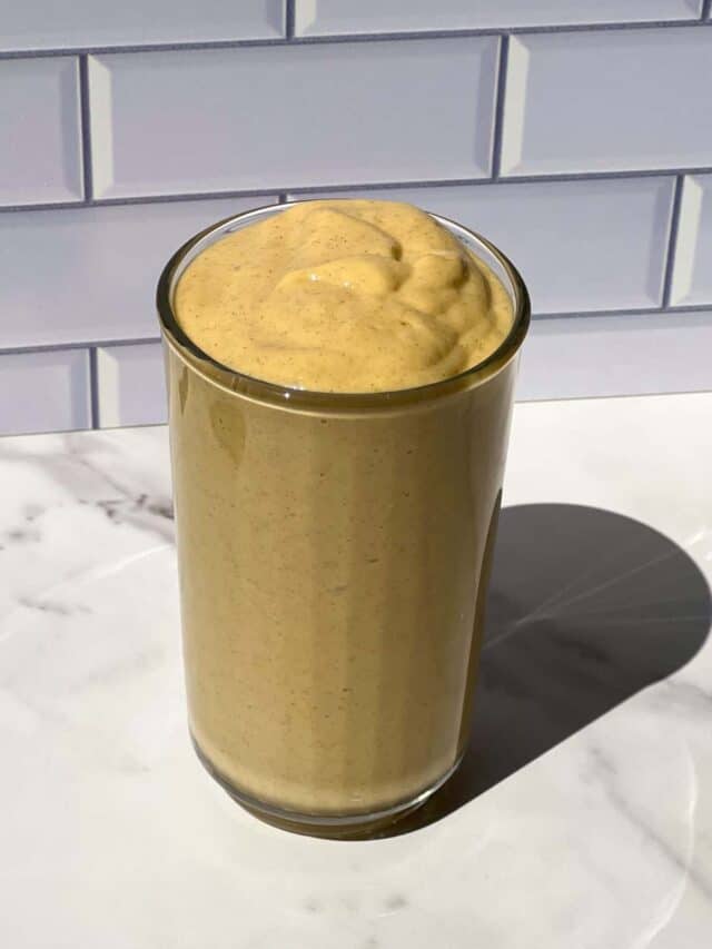 Mango Protein Smoothie in a glass.