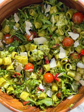 Rigatoni Pasta Salad with Parmesan and Pesto in a large serving bowl.