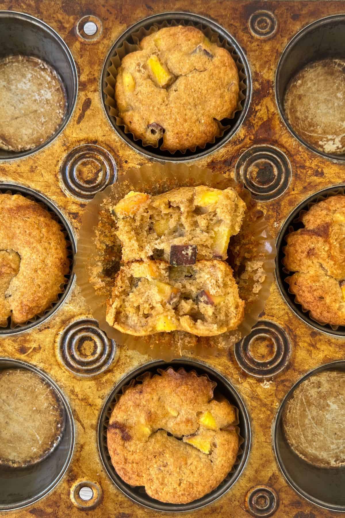 gluten free peach muffins freshly baked in the muffin tin