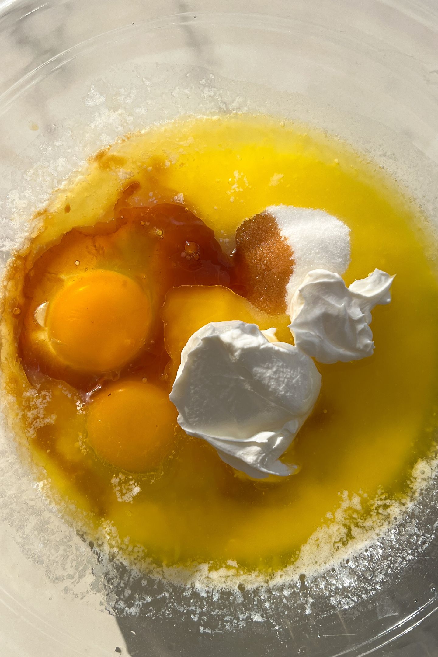 Wet ingredients in a large mixing bowl.
