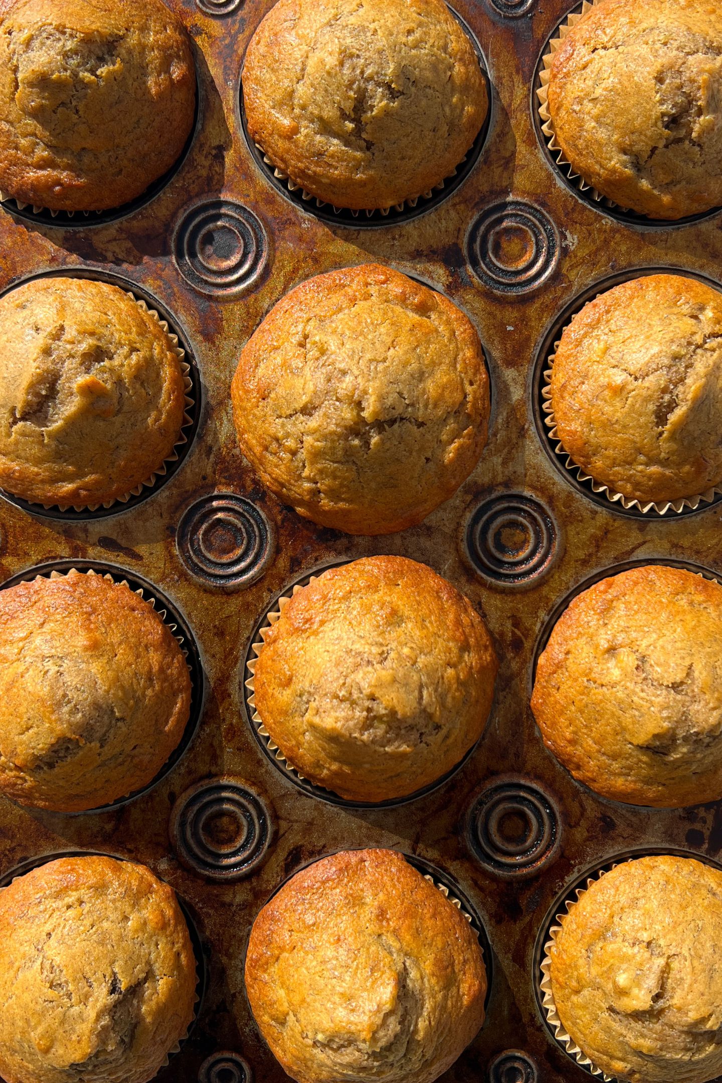Baked muffins in a muffin tin.