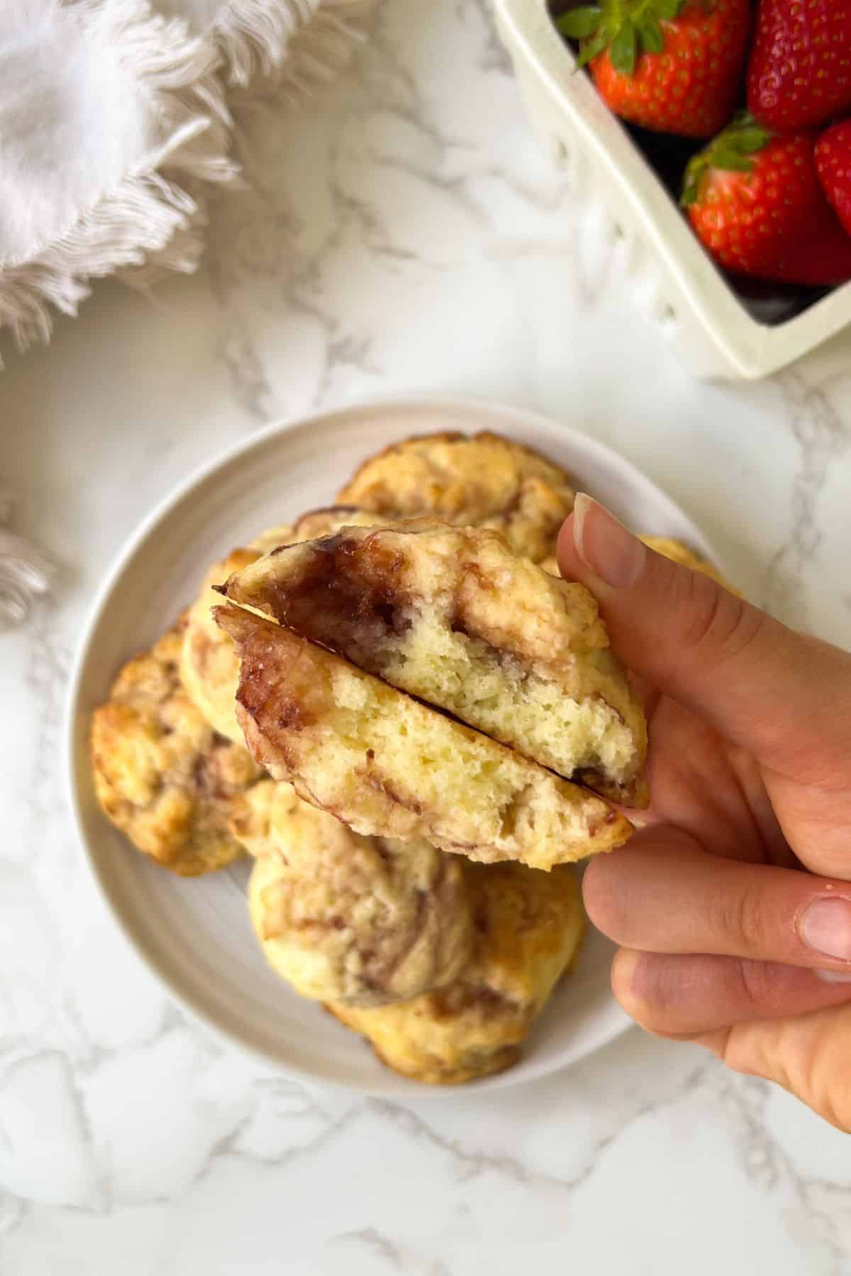 holding a split strawberry jam cookie in my hand