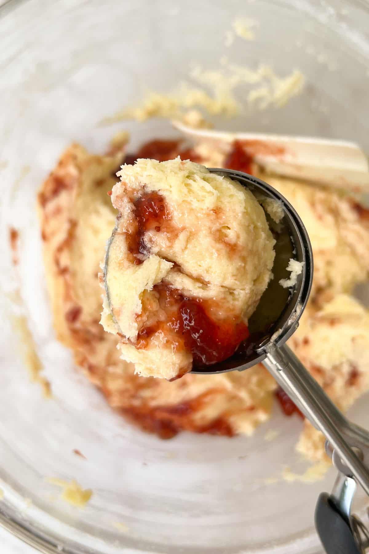 strawberry jam cookie dough in the ice cream scooper