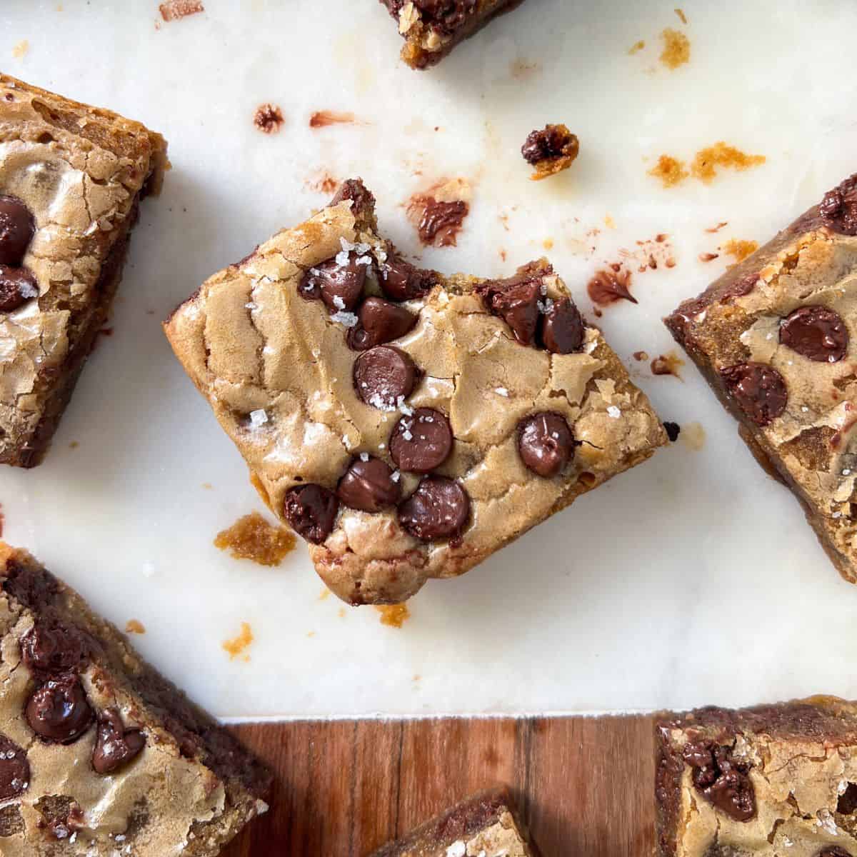 Gluten Free Blondie with a bite taken out of it.