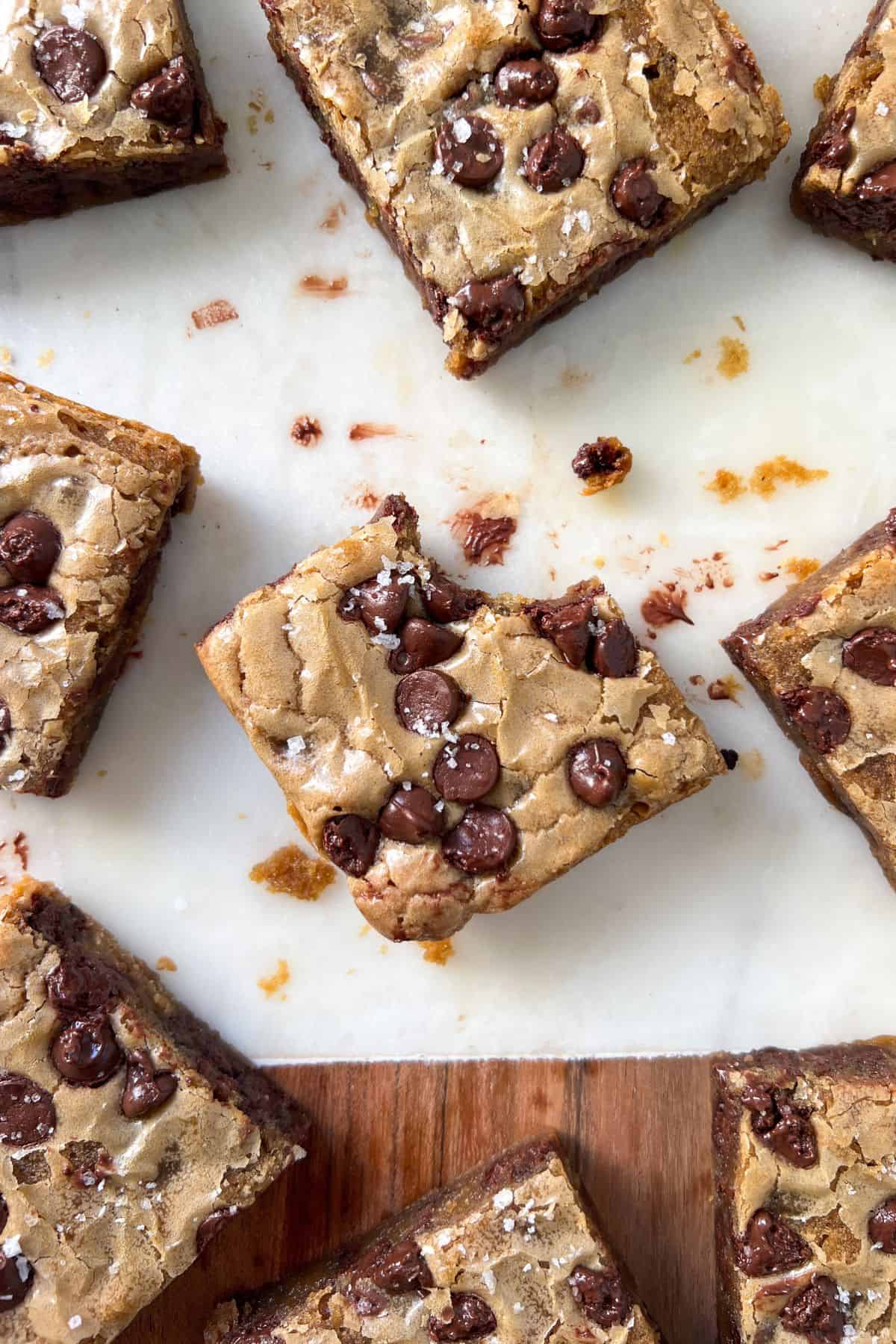 Gluten Free Blondie with a bite taken out of it.