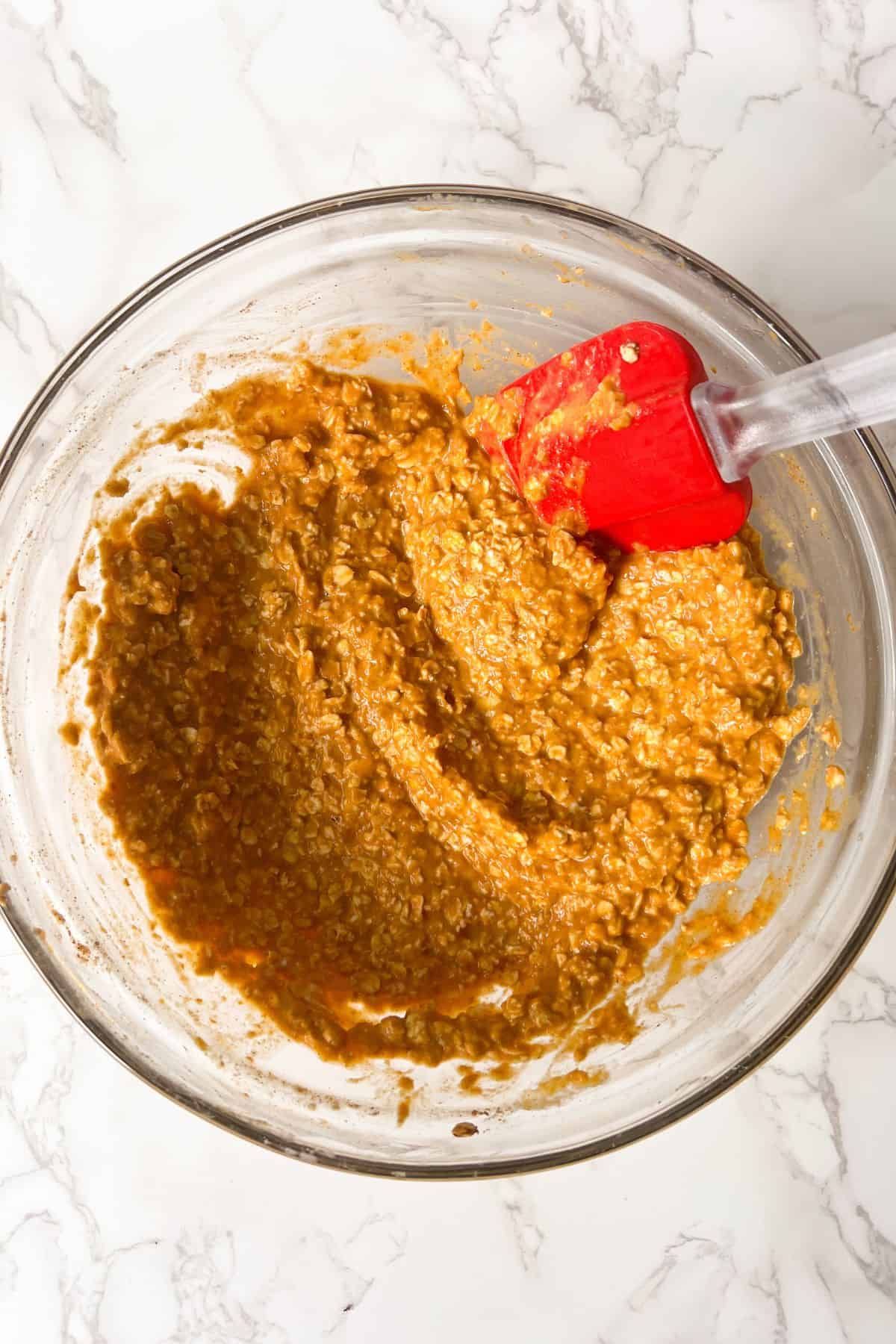 pumpkin baked oats without eggs batter made in a mixing bowl