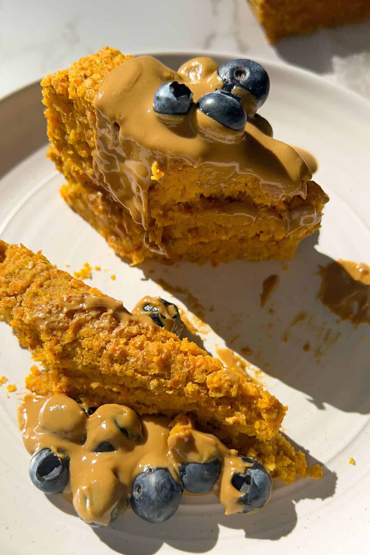 eating the carrot cake oatmeal bars with toppings