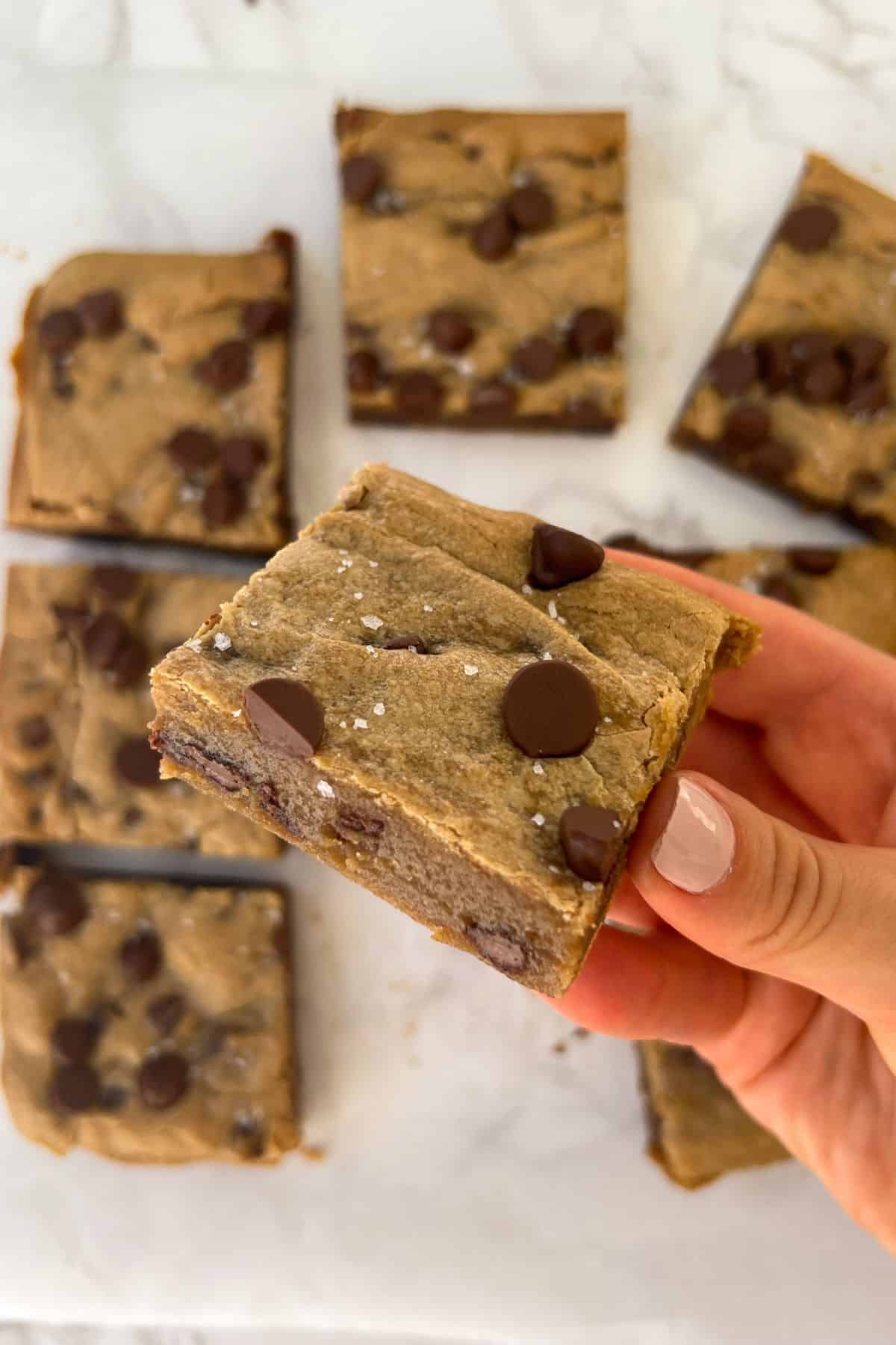 holding a gluten free blondie