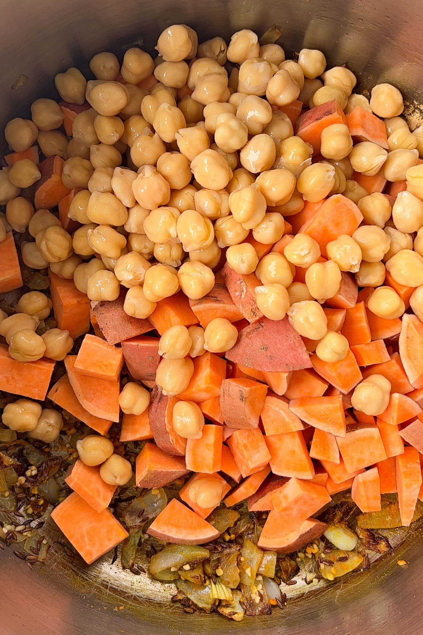 Rinse and drain the chickpeas then add to the pot.