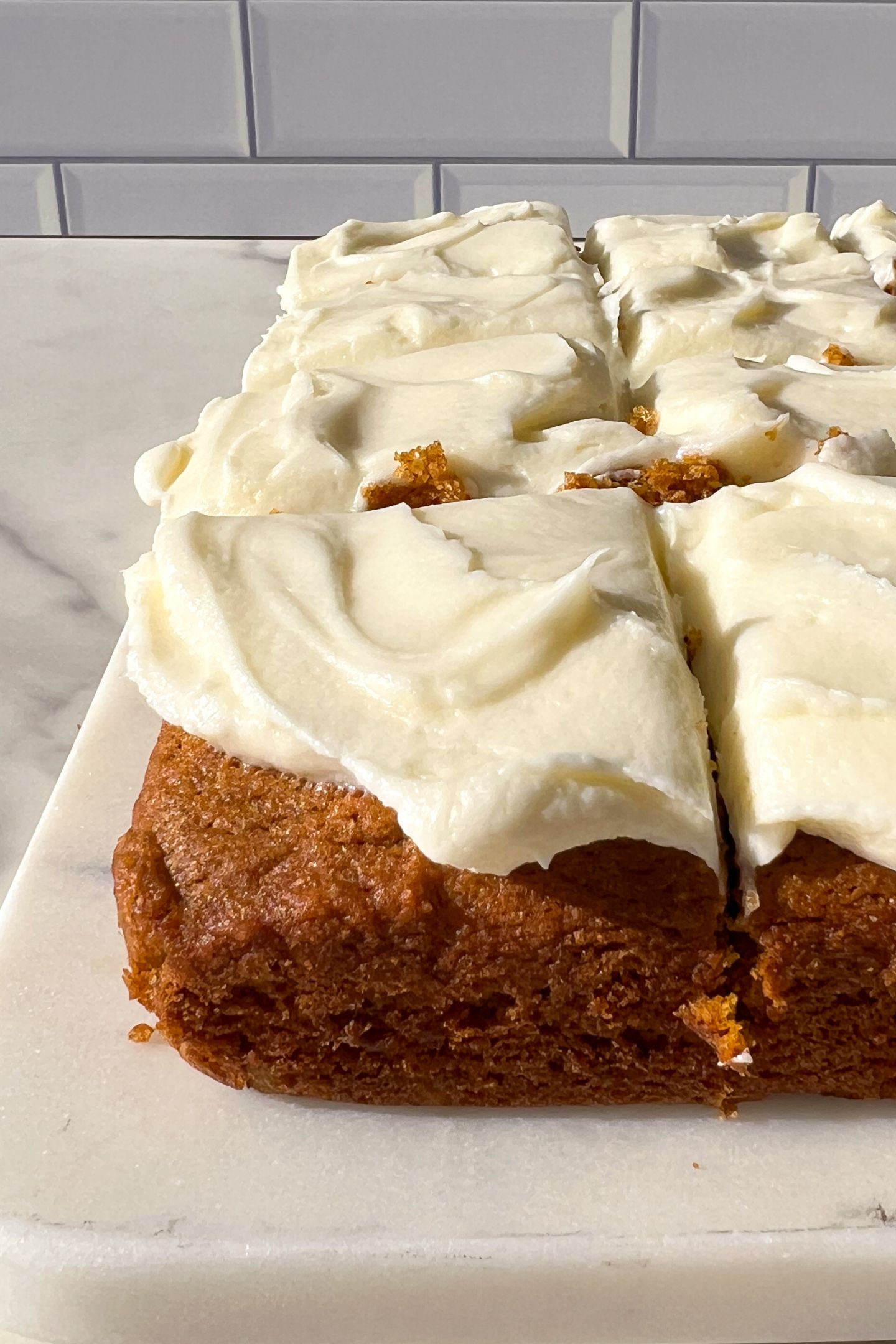Pumpkin Snack Cake topped with cream cheese frosting.