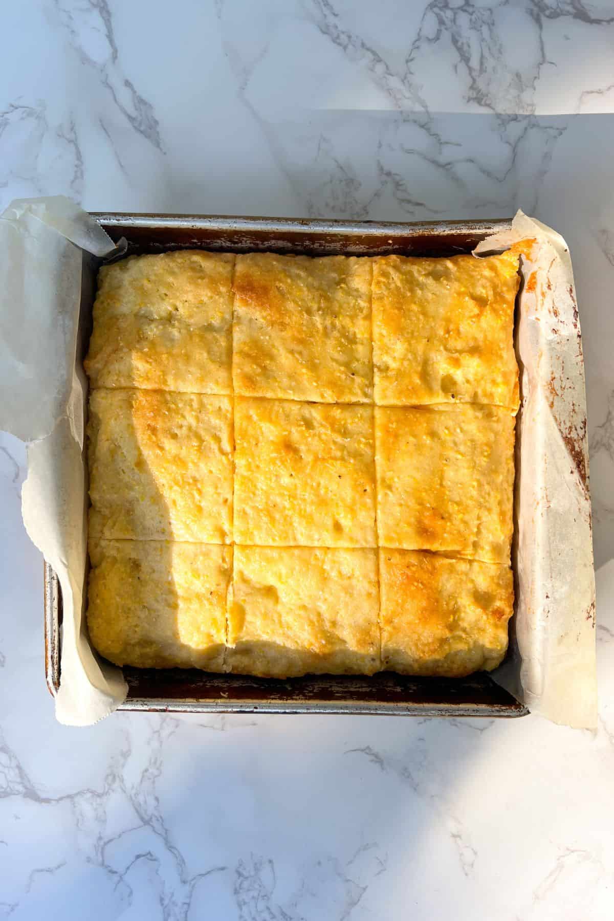 cornbread sliced in a pan