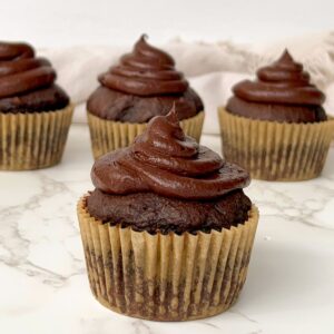 gluten free chocolate cupcake topped with chocolate coconut frosting