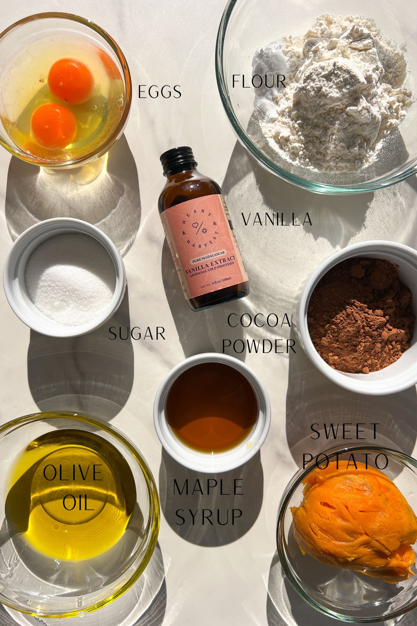 GF Chocolate Cupcake batter ingredients measured out in bowls.