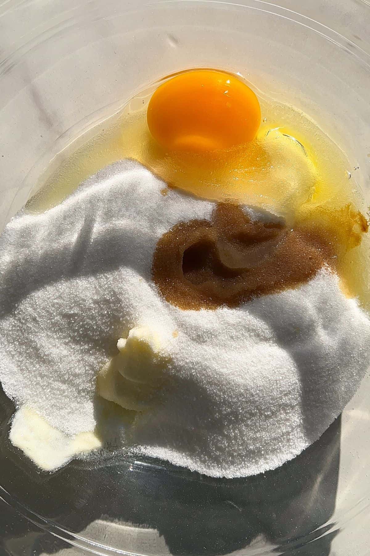 Mixing together the wet ingredients in a large mixing bowl.