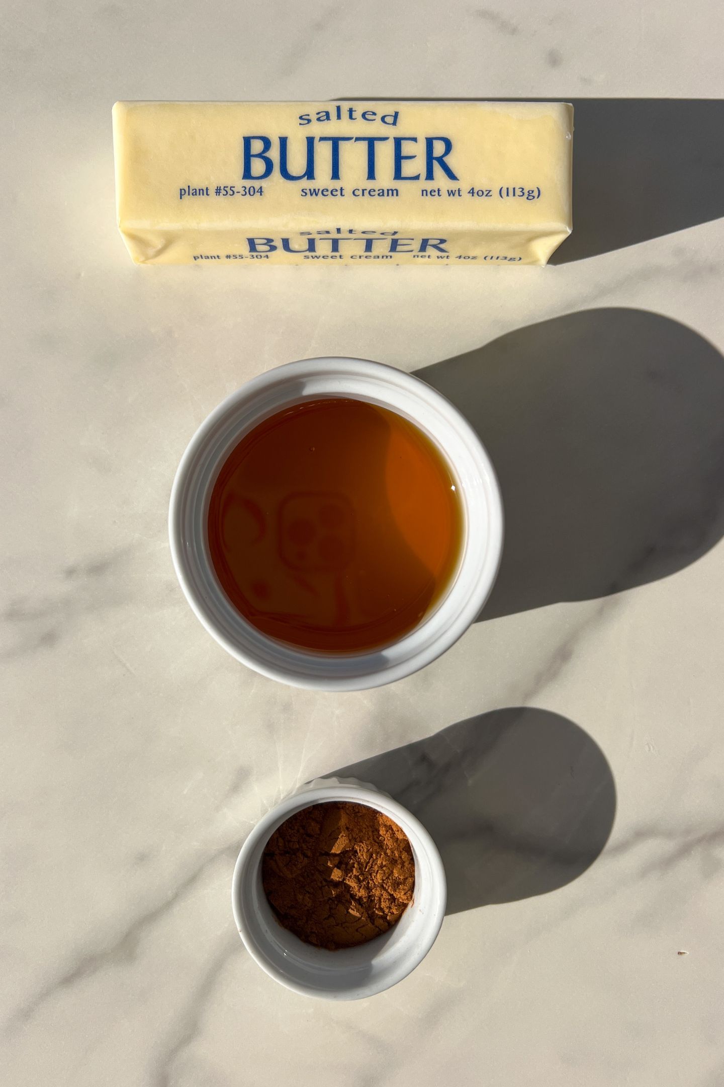 Ingredients measured out to make whipped honey cinnamon butter.