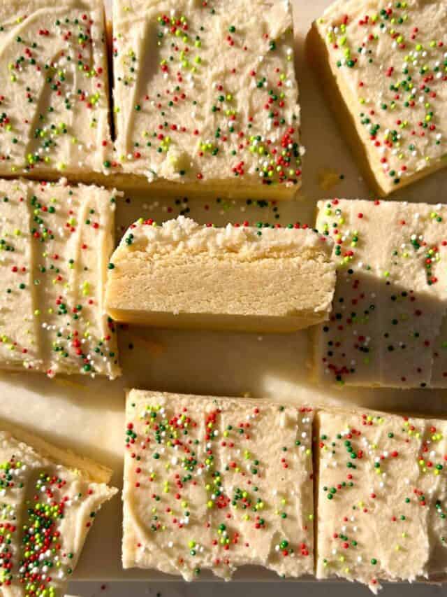 gluten free cookie cake topped with vanilla frosting and sprinkles