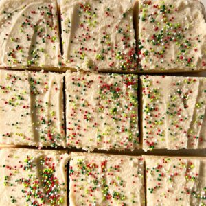 cut gluten free cookie cake with frosting and sprinkles