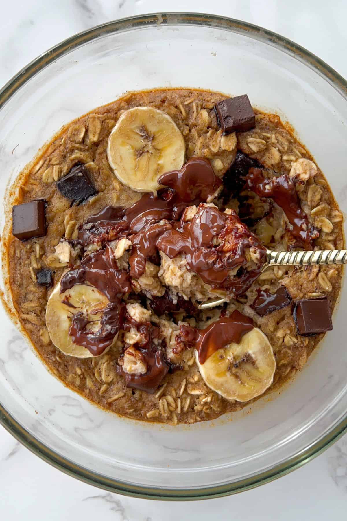 chocolate chip baked oats without egg in a bowl ready to be eaten