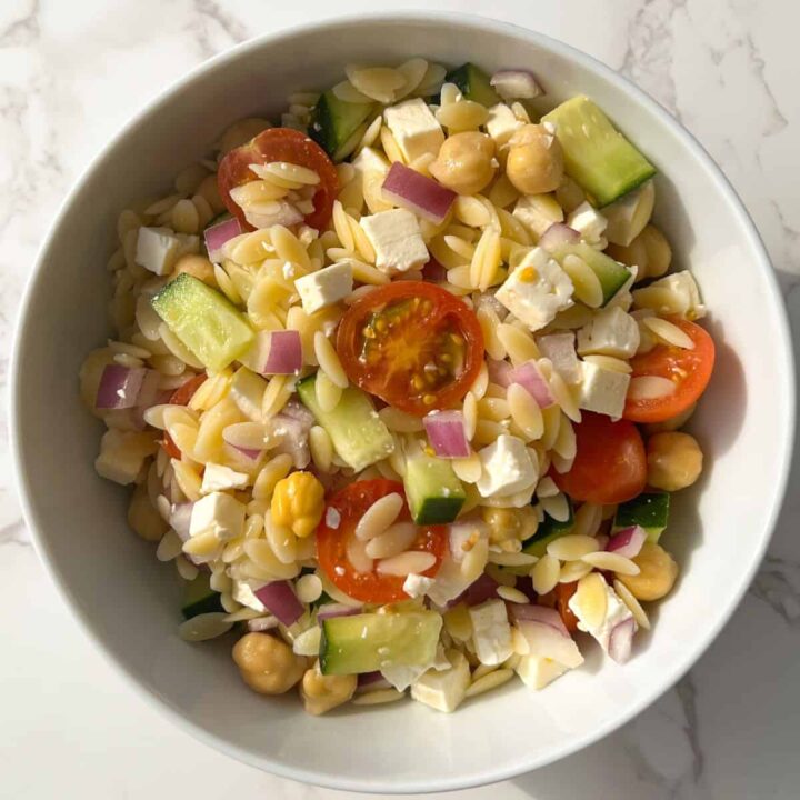 Greek Orzo Pasta Salad with Lemon Dijon Dressing Feasty Travels