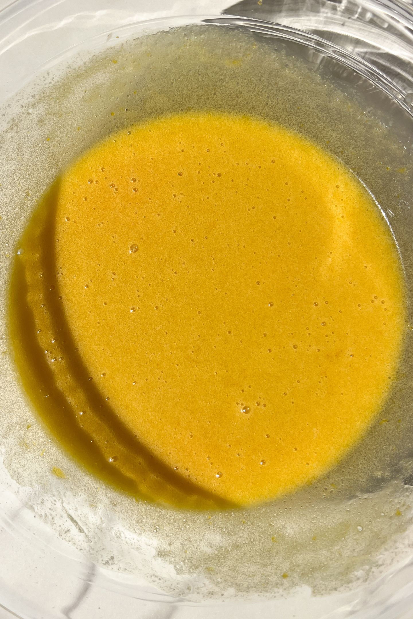 Mixing wet ingredients in the bowl.