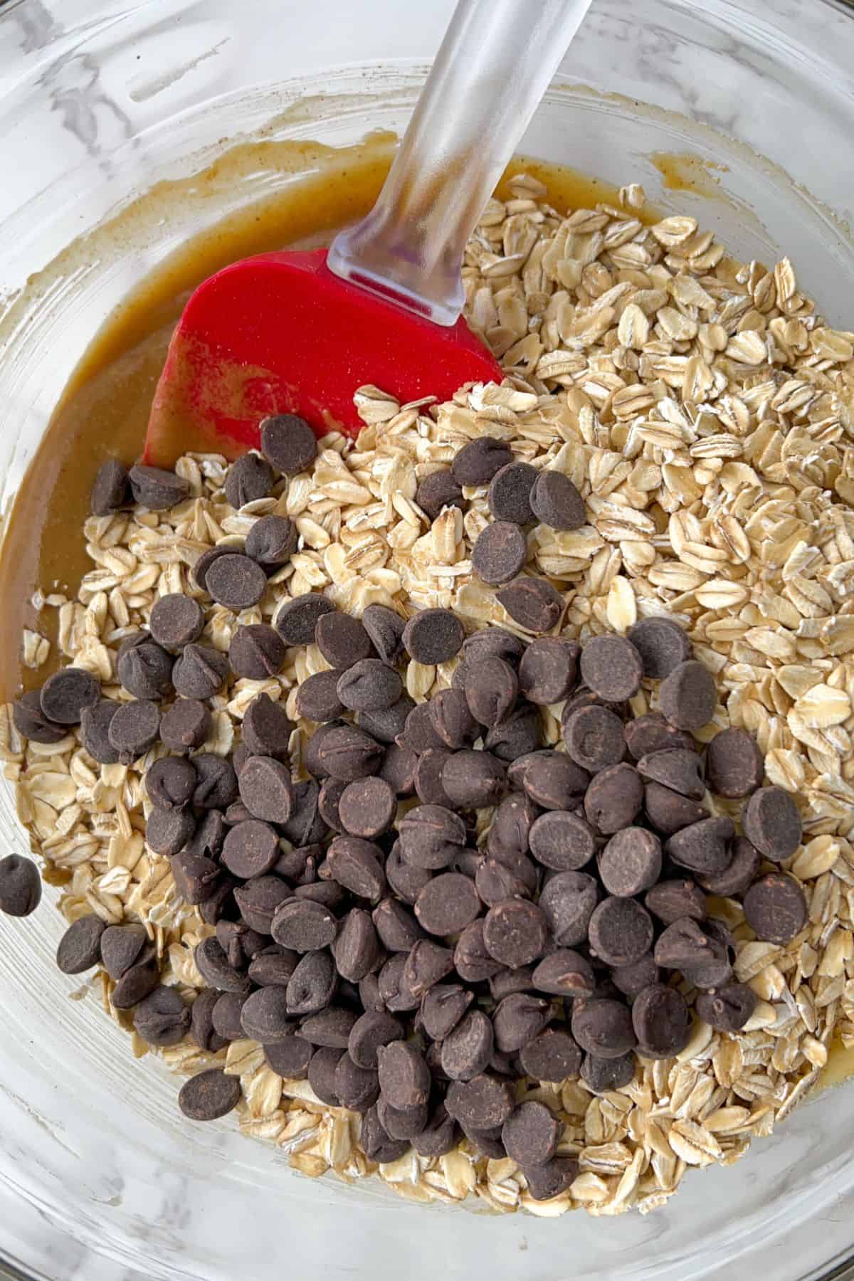 Making No Chocolate Oat Bars with Peanut Butter in a Mixing Bowl