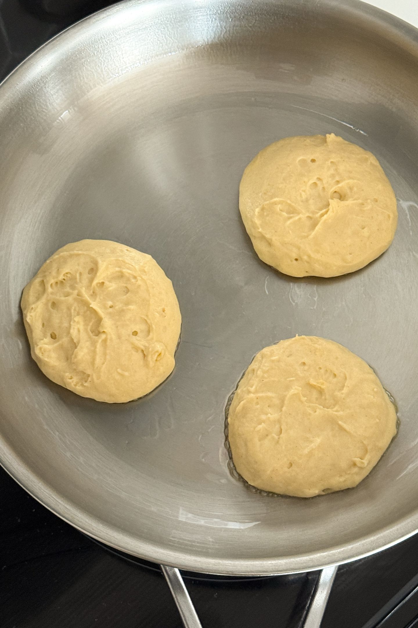 Making the pancakes on a heated saute pan.