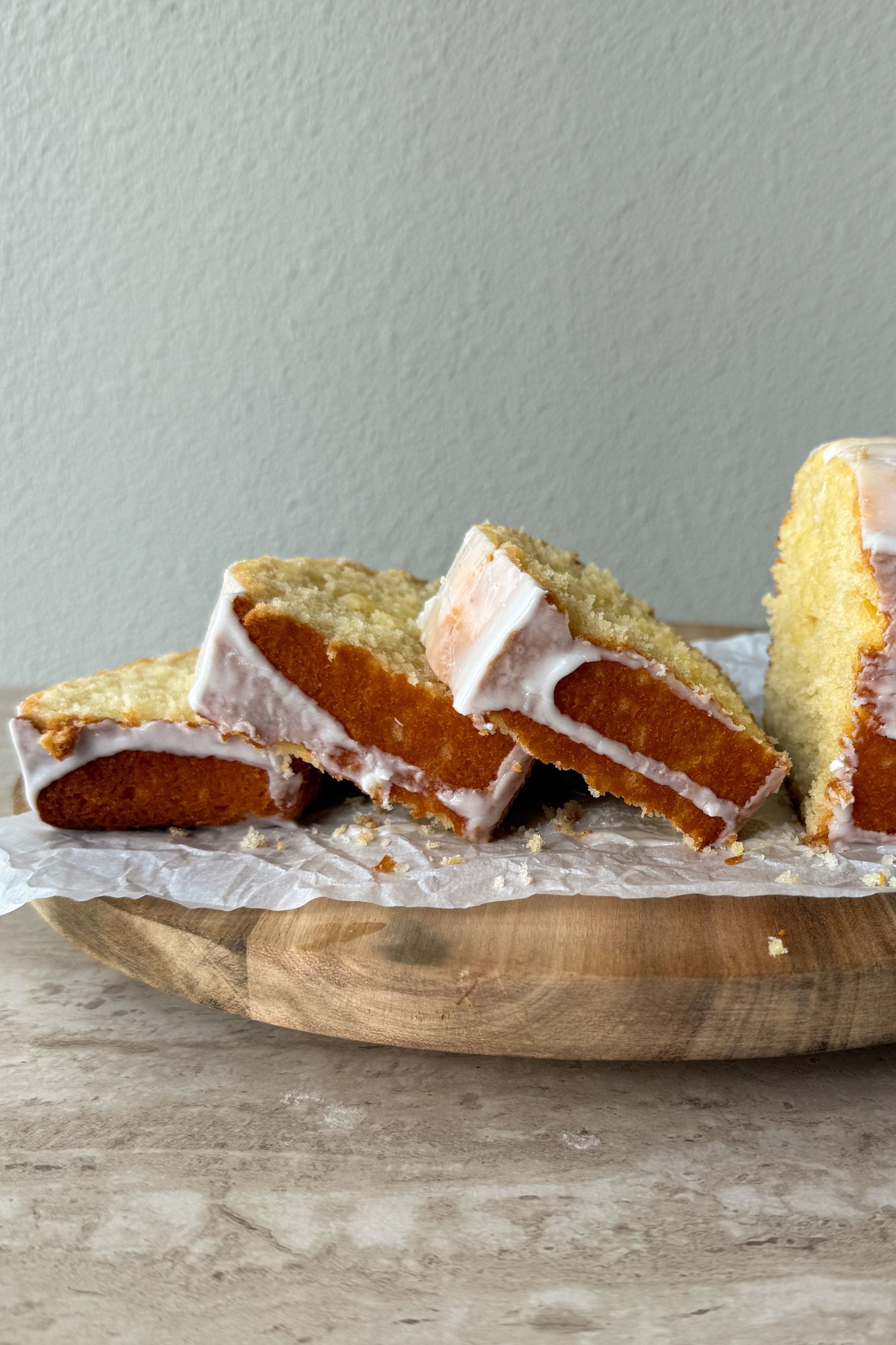 Slices of old fashioned lemon pound cake on the platter.