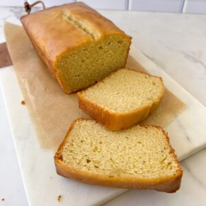 Slices of Starbucks Lemon Loaf on a cutting board.