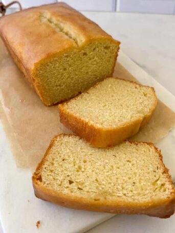 Slices of Starbucks Lemon Loaf on a cutting board.