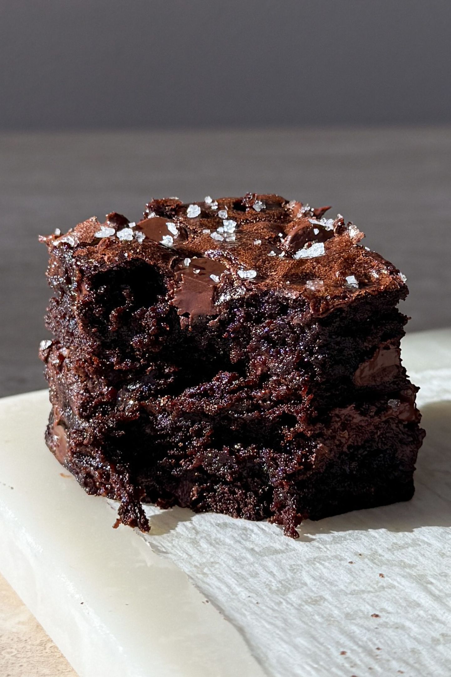 Eating two espresso brownies stacked on top of each other.