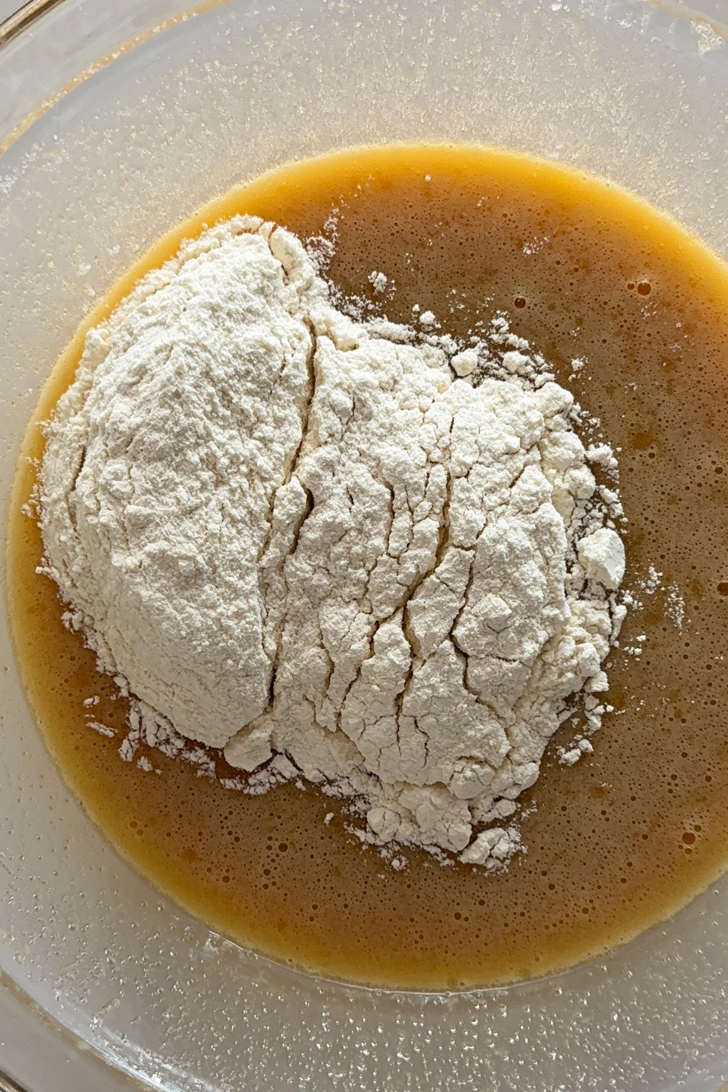 Adding the flour to the ingredients.