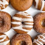 Gluten Free Pumpkin Donuts with a Maple Syrup Glaze or Pumpkin Spice and Sugar Coating.