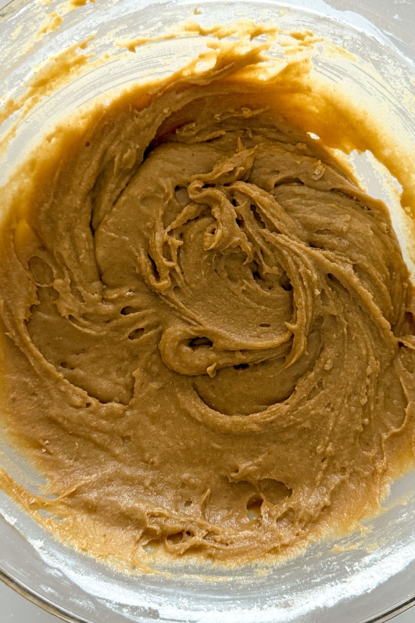 Wet and dry ingredients just combined in the mixing bowl.