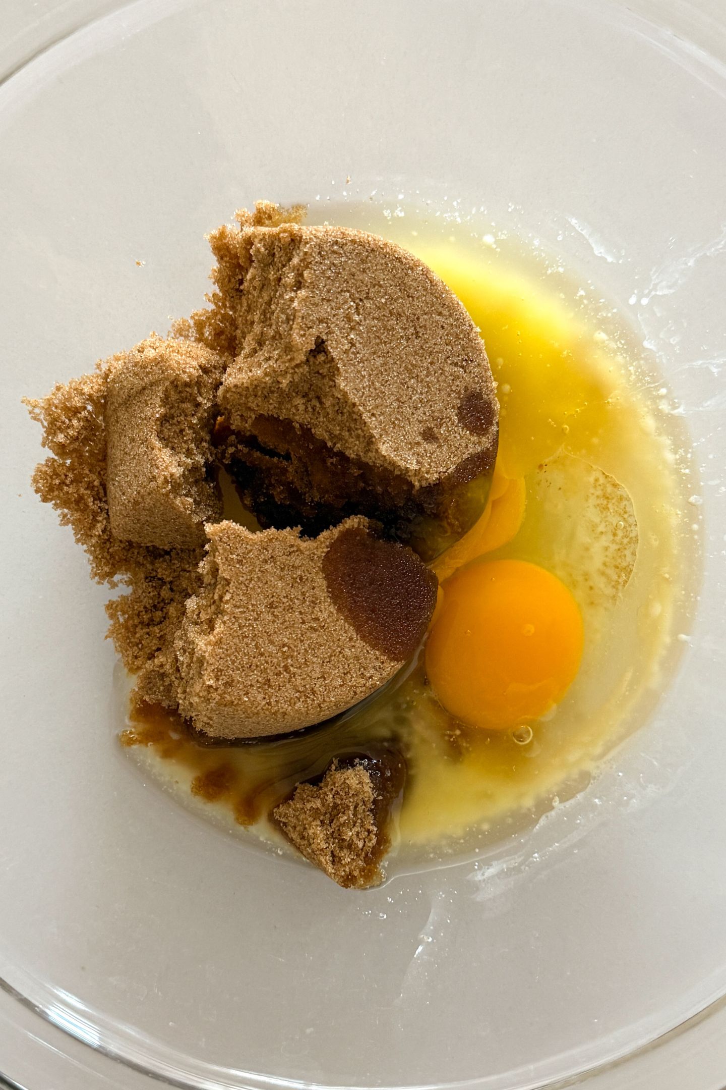 Wet ingredients added to a large mixing bowl.