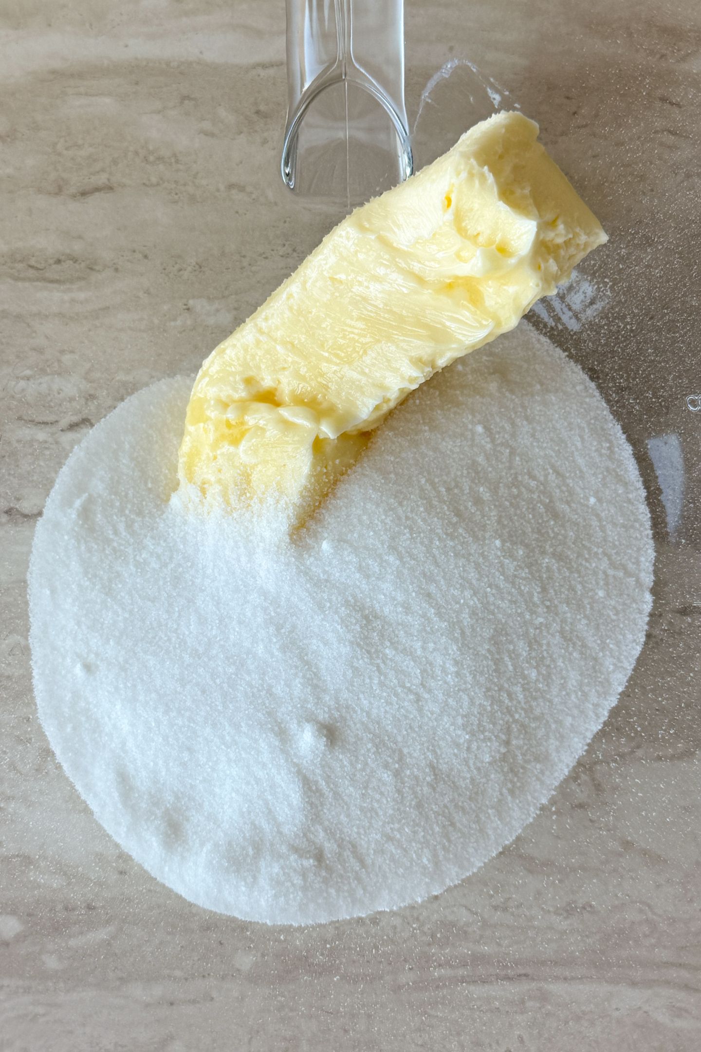 Creaming butter and sugar together in a bowl.