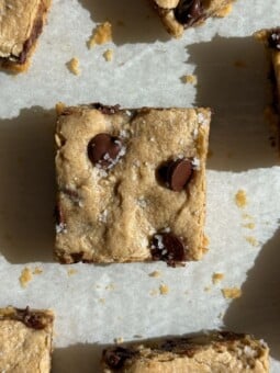 Gluten free blondies topped with chocolate chips and sea salt.