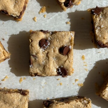 Gluten free blondies topped with chocolate chips and sea salt.